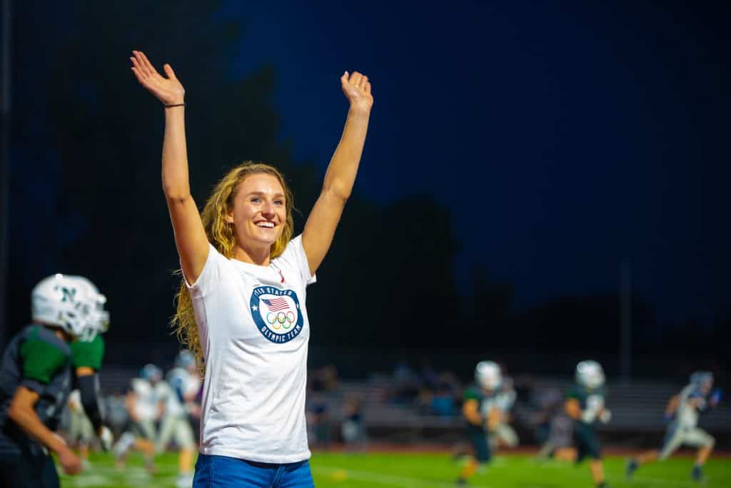 Elise Cranny Waves to Crowd