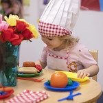 Child at dramatic play dressed up as a chef.